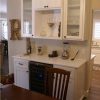 White built in bar cabinets